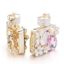 Perfume bottle with crystals and flowers - keychainKeyrings