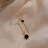 Long earrings with black circleEarrings