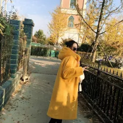 Fashionable fur coat with hoodieJackets