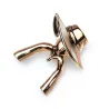 Lady figure wearing hat - broochBrooches