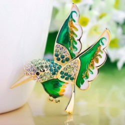 Elegant brooch - with green crystal bird